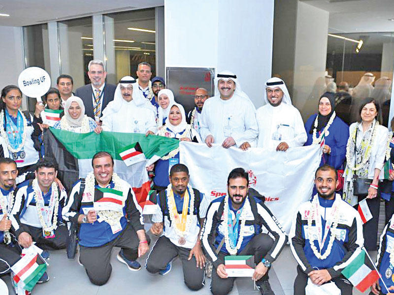 الجاسم يتوسط وفد الأولمبياد الخاص بعد عودته