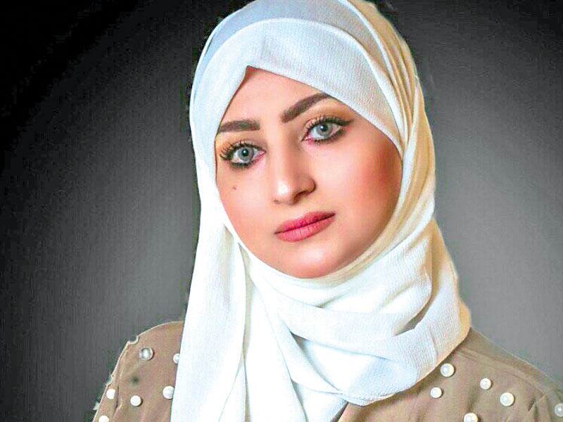 الأديبة والفنانة التشكيلية السعودية وهبة العطار