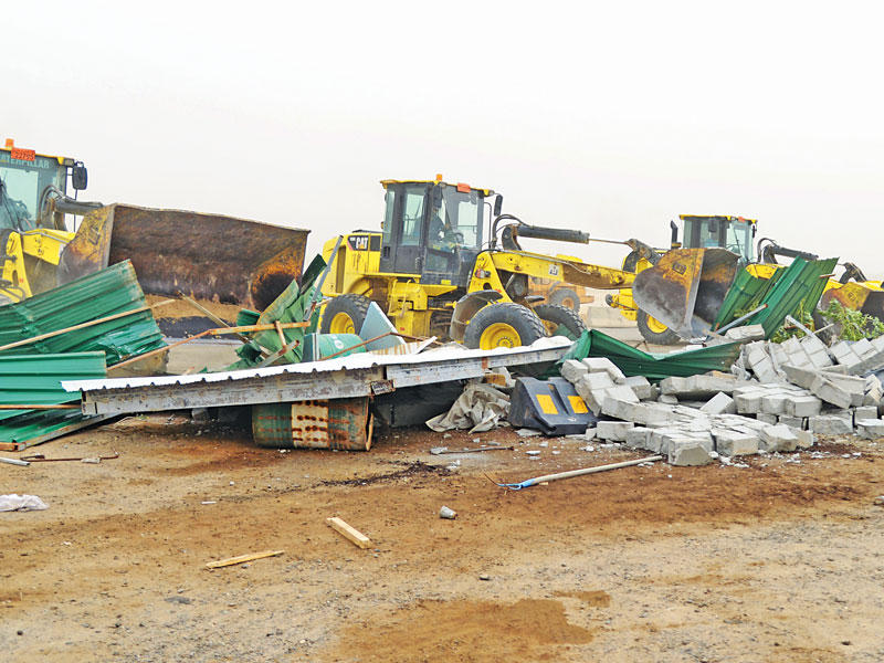جانب من إزالة التشوينات المخالفة في الصليبيةn