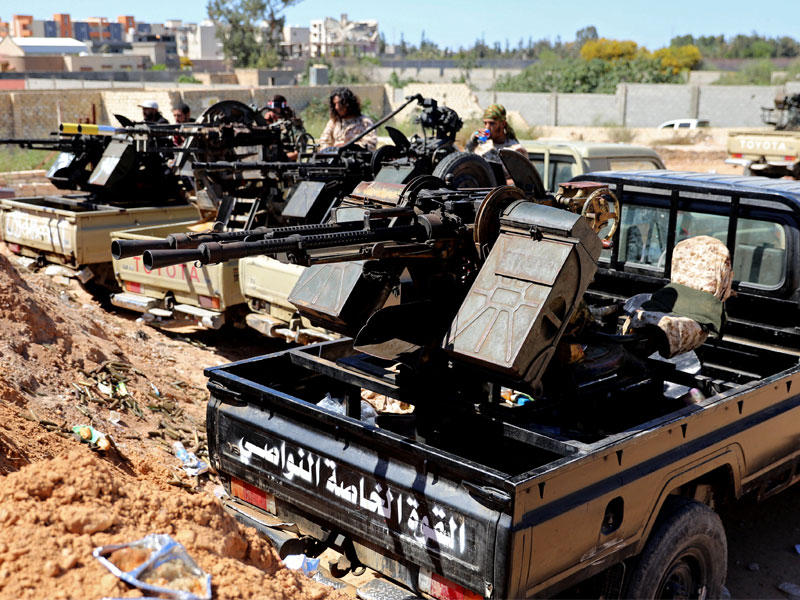 حشد لقوات حماية طرابلس أمس الأول (رويترز)