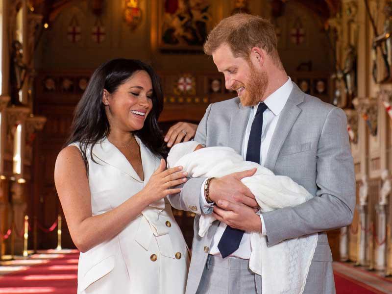 الأمير هاري وزوجته ميغن ماركل و أرتشي ابنهما