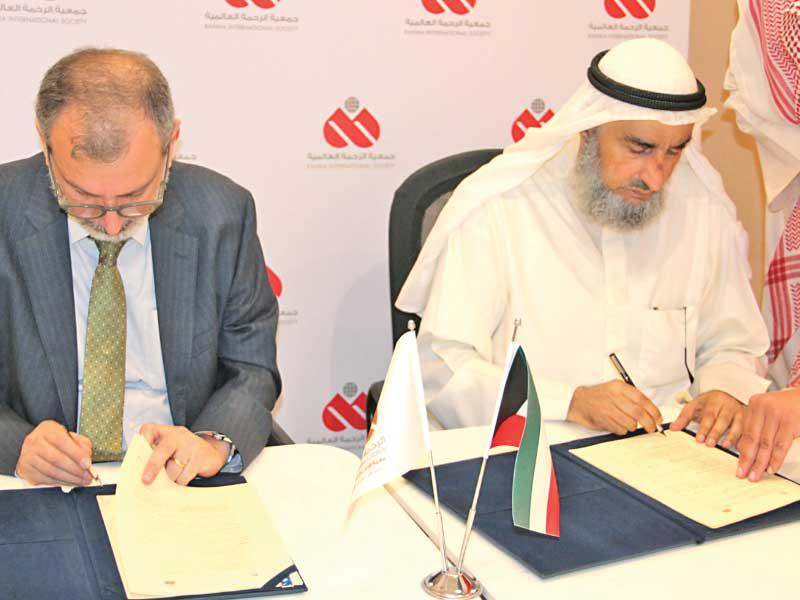 العقيلي وحدادين يوقعان الاتفاقية