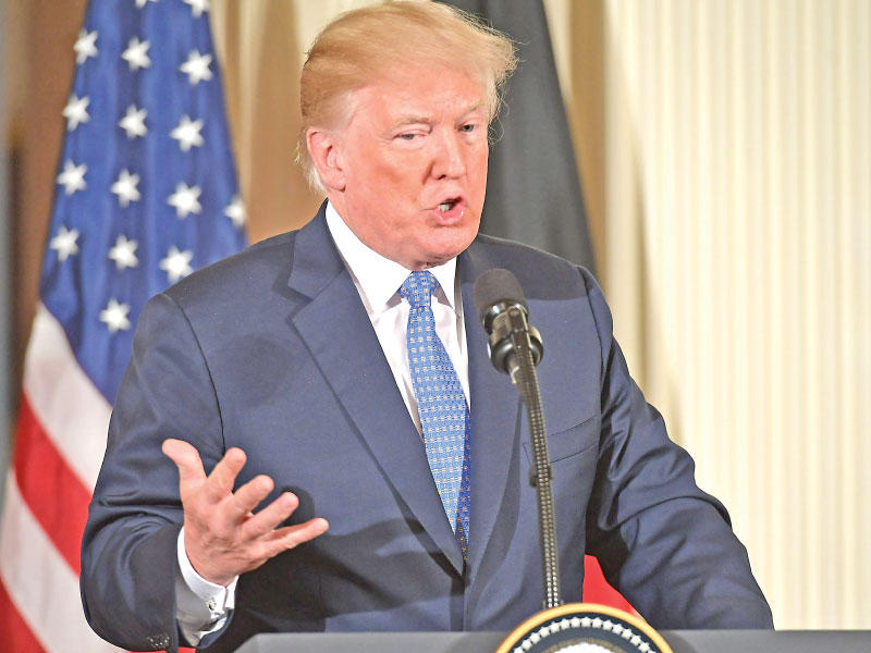 دونالد ترامب متحدثاً عن الرسوم الجمركية