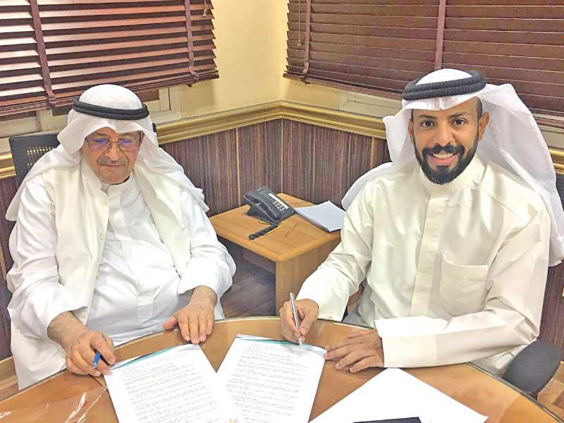 جانب من توقيع الاتفاقية