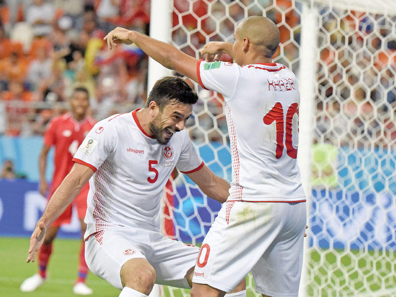 لاعبو المنتخب التونسي خلال إحدى المباريات السابقة  (أ ف ب)