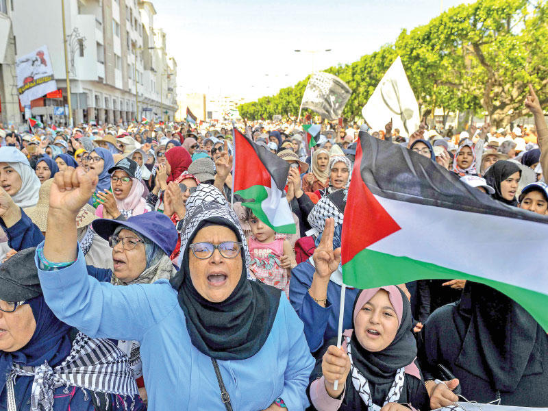 تظاهرة في الرباط رفضاً لمؤتمر المنامة أمس               (أ ف ب)