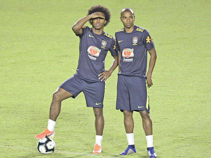 فيرناندينيو وويليان خلال تدريبات السيليساو