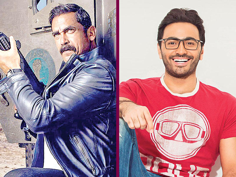 من يمين الصورة الفنان تامر حسني و الممثل أمير كرارة