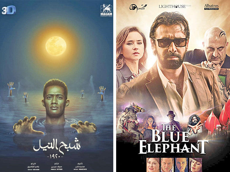 من يمين الصورة بوستر فيلم « الفيل الأزرق 2» و بوستر فيلم « شبح النيل»