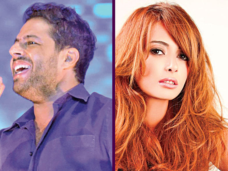 من يمين الصورة الفنان محمد حماقي و الفنانة داليا مصطفى 