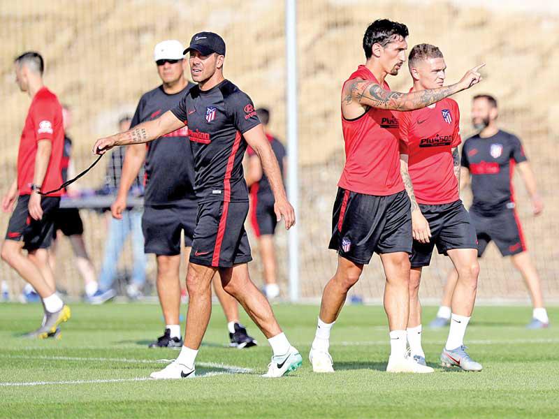 تريبيير خلال تدريبات أتلتيكو مدريد