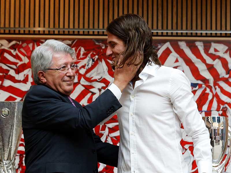 فيليبي لويس وسيريزو رئيس نادي أتلتيكو مدريد