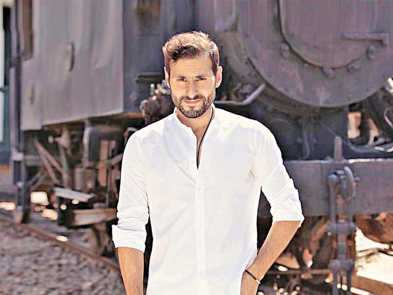 الفنان علي كاكولي