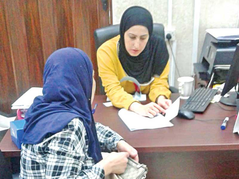 جانب من توزيع الكوبونات