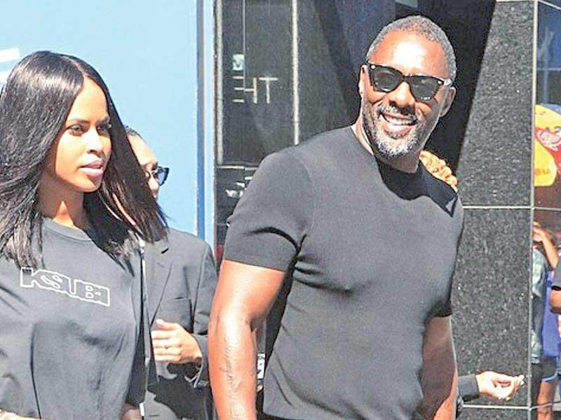 النجم العالمي ​إدريس ألبا​ وزوجته