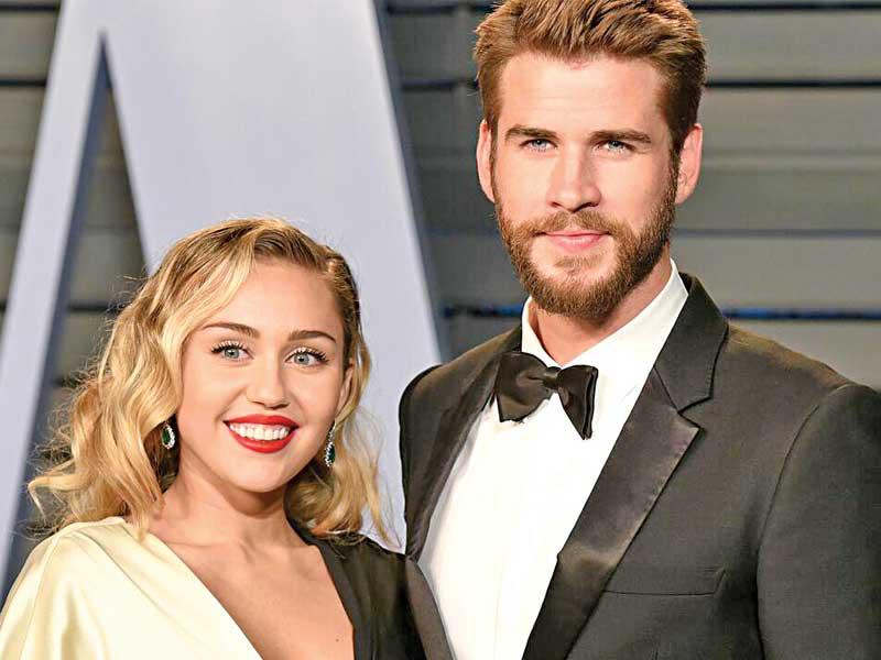 المغنية مايلي سايرس وزوجها الممثل ليام هيمسوورث