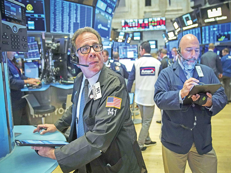 افتتاح بورصة نيويورك على ارتفاع مؤشر داو جونز أمس (أ ف ب)