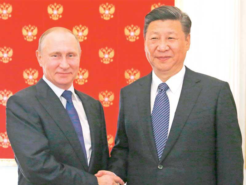 فلاديمير بوتين مع شي جينبينغ  