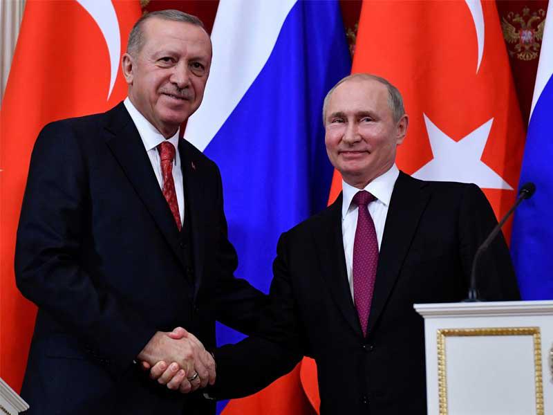  الرئيس التركي رجب طيب إردوغان مع نظيره الروسي فلاديمير بوتين