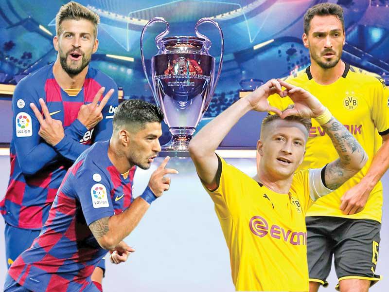 من يمين الصورة هوميلز و رويس نجما دورتموند و سواريز و بيكيه نجما برشلونة