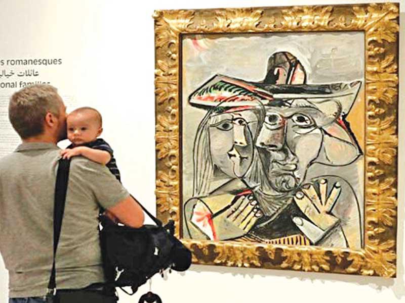 لوحة بيكاسو أمام زائر وابنه  