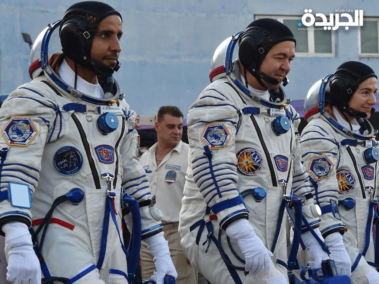 هزاع المنصوري والروسي أليسكي أوفتشينين والأميركي نيك هايغ