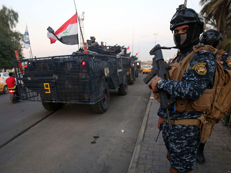 الشرطة العراقية تنتشر في مدينة الصدر أمس الأول (أ ف ب) 