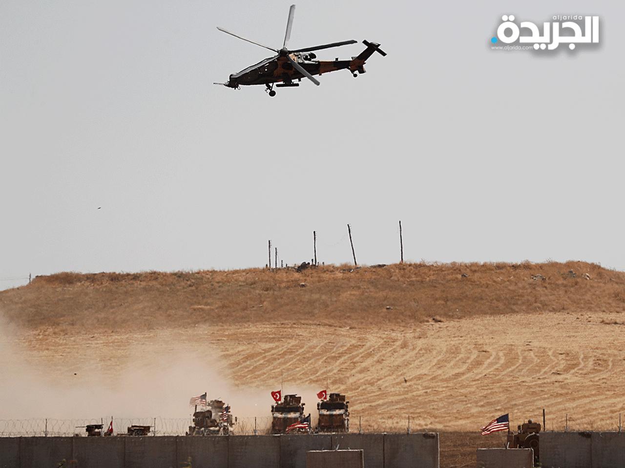 مدرعات تركية على الحدود السورية خلال لقائها بالقوات الأميركية أمس 