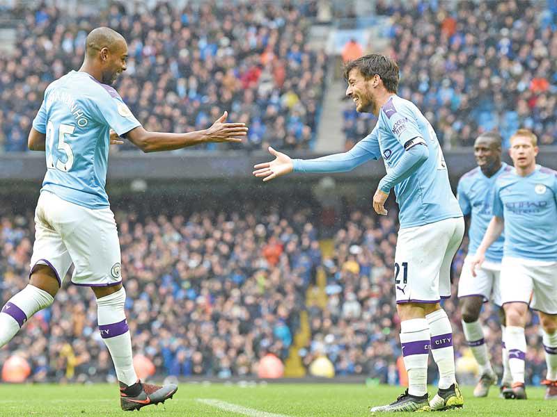 لاعبو مانشستر سيتي خلال مباراة سابقة