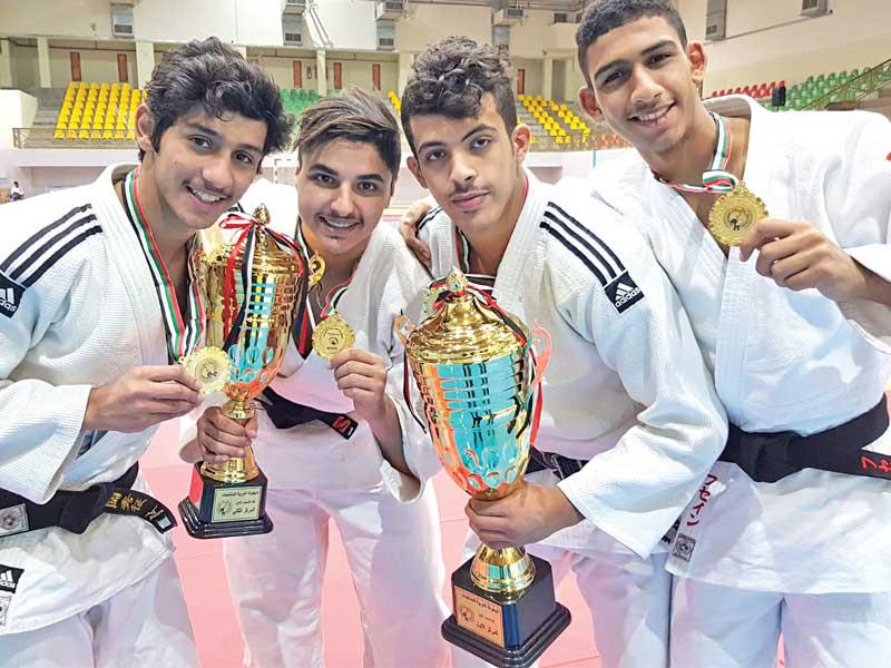 لاعبو منتخب الكويت للجودو الحاصلون على الميداليات الذهبية