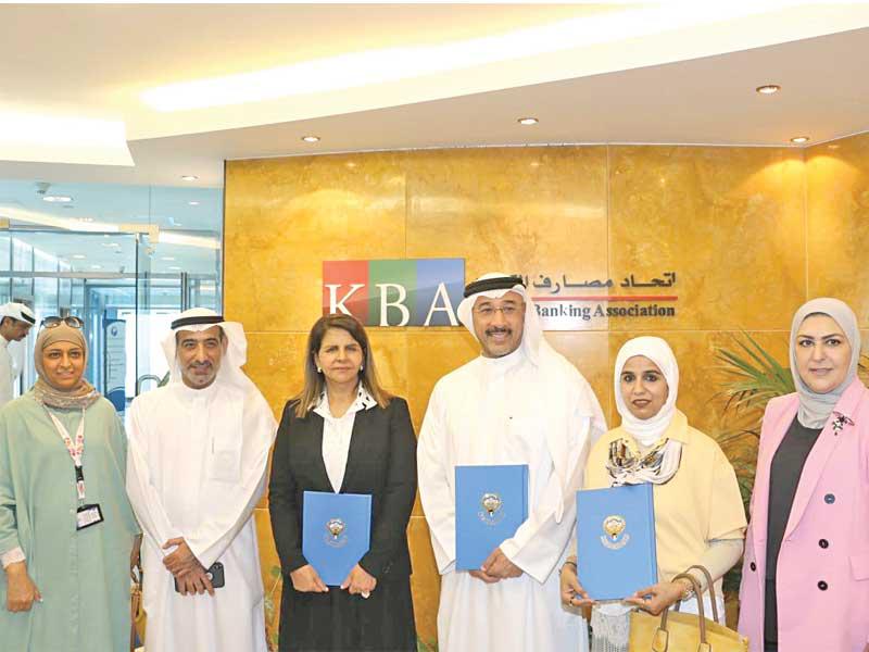 العوضي والحساوي عقب توقيع البروتوكول