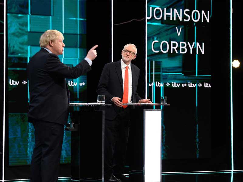 جونسون وكوربين خلال مناظرتهما أمس الأول   (أ ف ب)