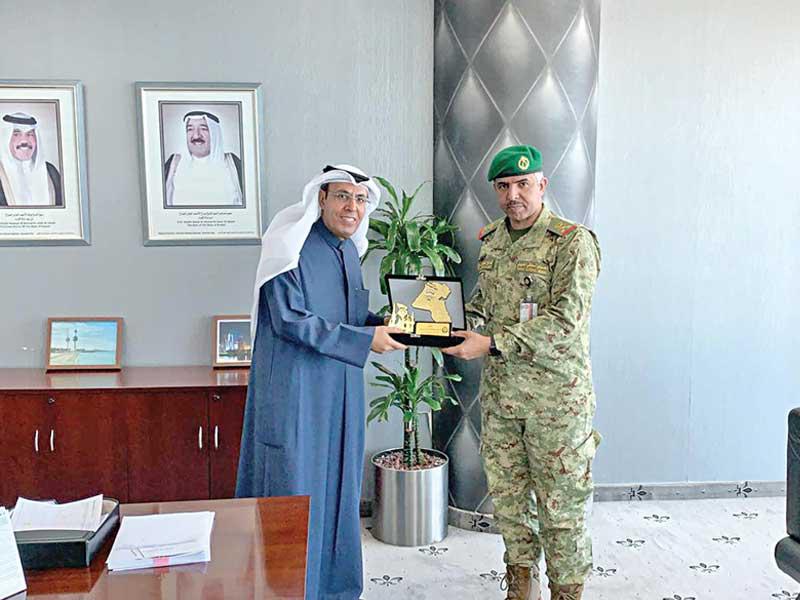 معاون قسم العمليات والتدريب في الحرس الوطني اللواء الركن فالح شجاع والمدير العام للجهاز الوطني للاعتماد الأكاديمي وضمان جودة التعليم د. حمد العدواني