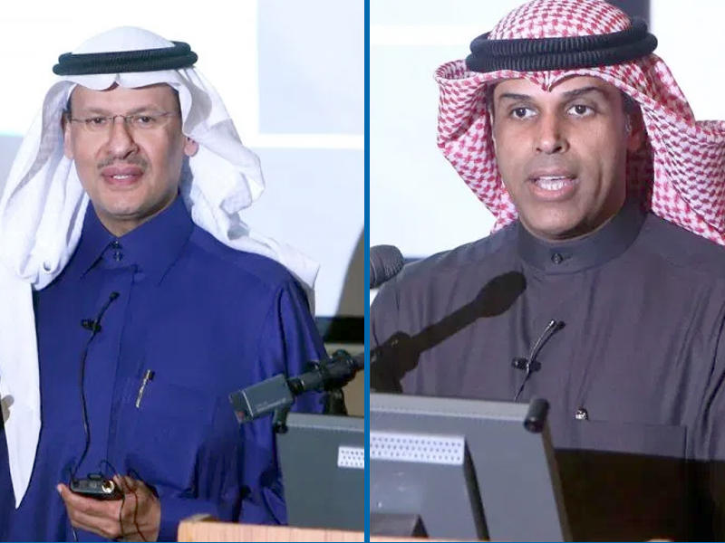 وزير النفط الكويتي خالد الفاضل (يمين) ووزير النفط السعودي عبد العزيز بن سلمان (يسار) يتحدثان خلال حفل بمناسبة توقيع اتفاقية إعادة إنتاج النفط في المنطقة المحايدة بين الكويت والمملكة العربية السعودية