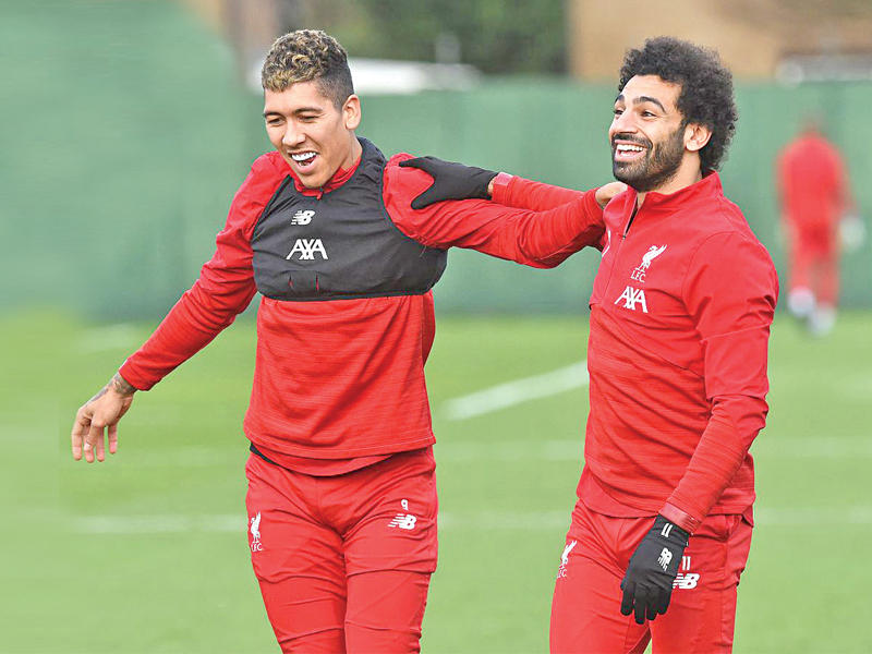 صلاح وفيرمينيو أثناء التدريبات