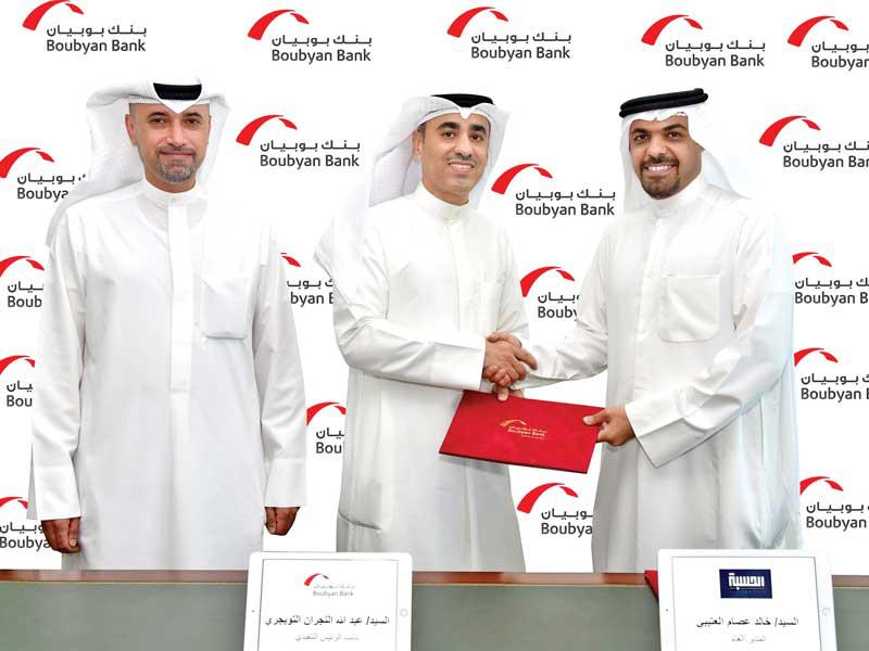 التويجري والعتيبي عقب توقيع الاتفاقية