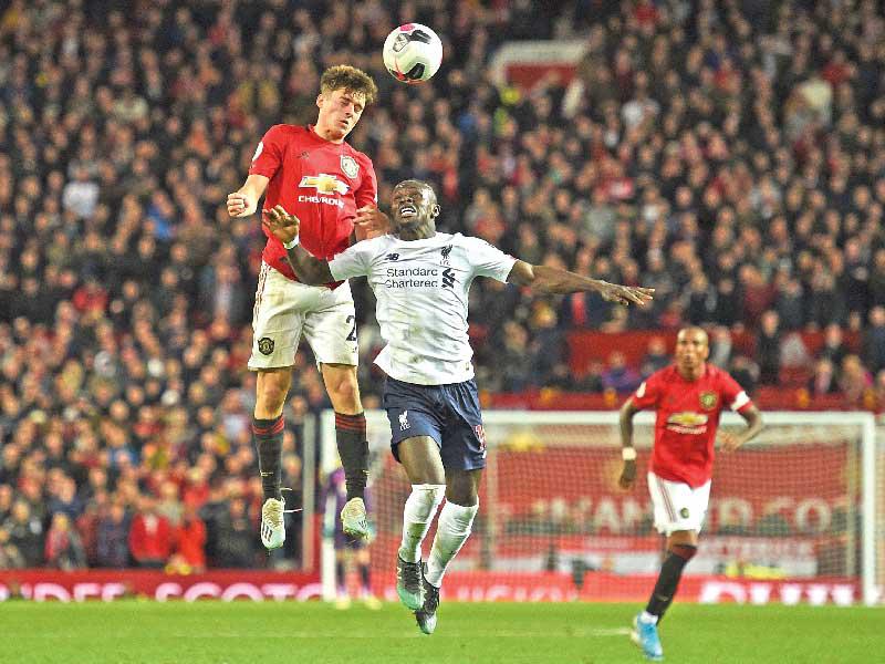 جانب من مباراة سابقة بين ليفربول ومانشستر يونايتد