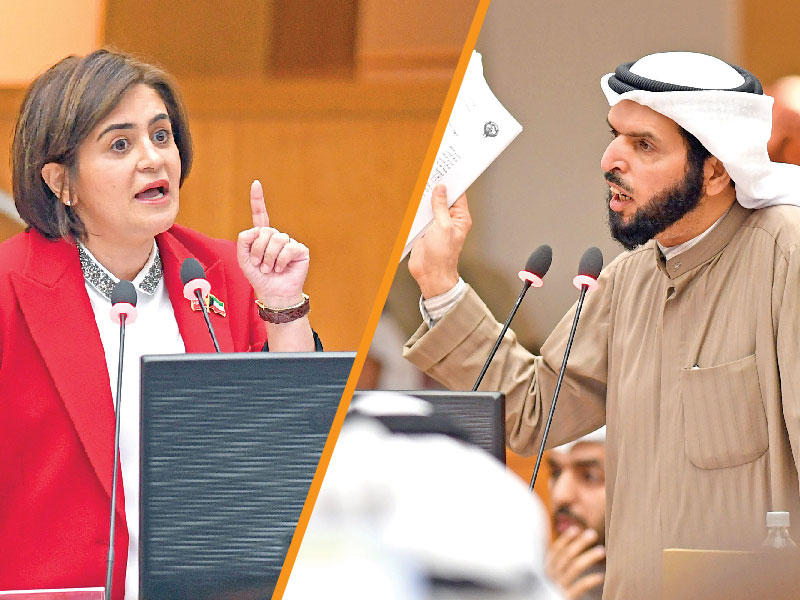 النائب د. عادل الدمخي خلال الاستجواب أمس  والوزيرة د. غدير أسيري ترد (تصوير عبدالله الخلف)