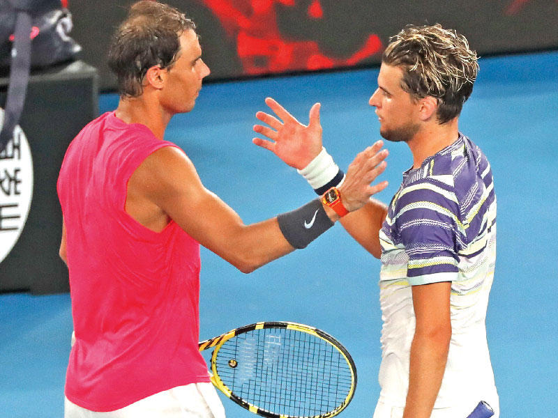 تييم يصافح نادال بعد المباراة