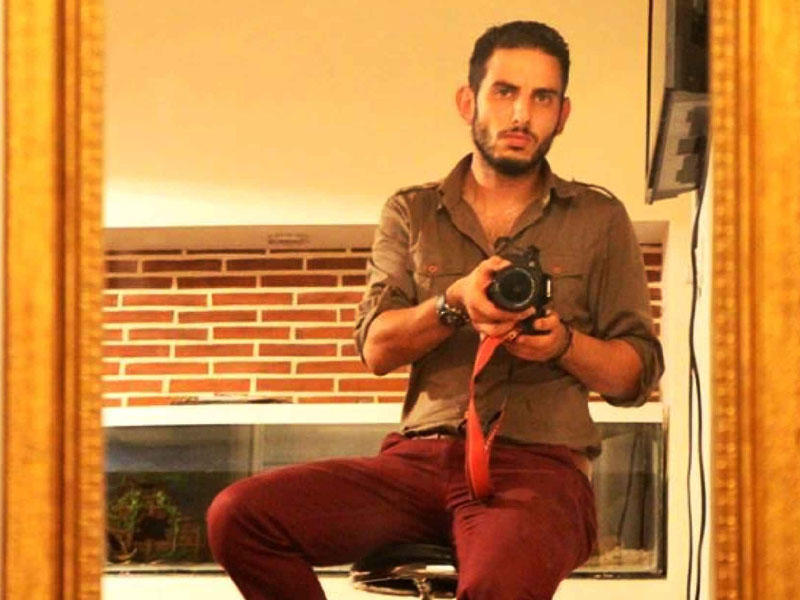 الرسام الكاريكاتوري الجزائري عبدالحميد أمين