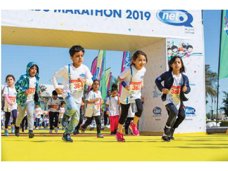 مشاركون في  سباق خيري للأطفال في الكويت تنظمه كواليتي نت