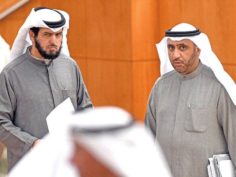 النائب محمد الدلال و النائب د. عادل الدمخي