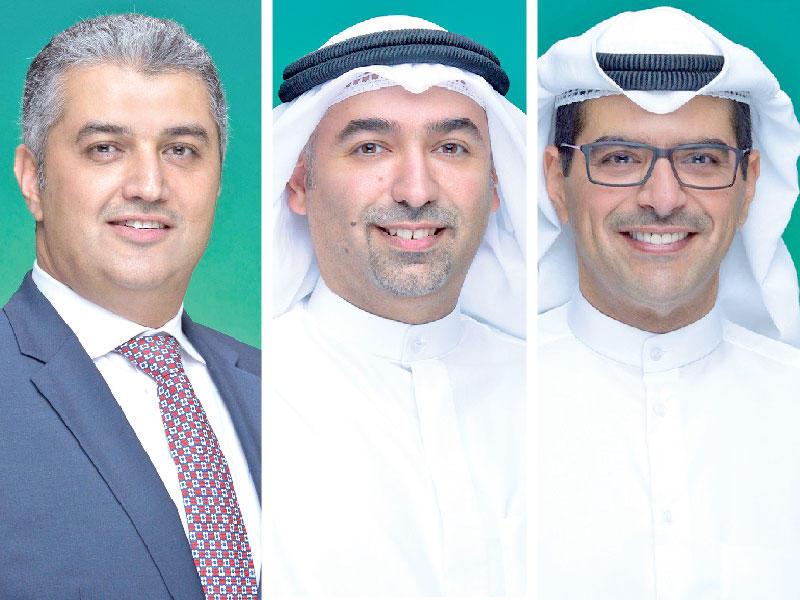 الرئيس التنفيذي للمجموعة في بيت التمويل الكويتي «بيتك»، مازن الناهض- رئيس الاستراتيجية للمجموعة فهد المخيزيم- رئيس المالية للمجموعة في «بيتك»، شادي زهران