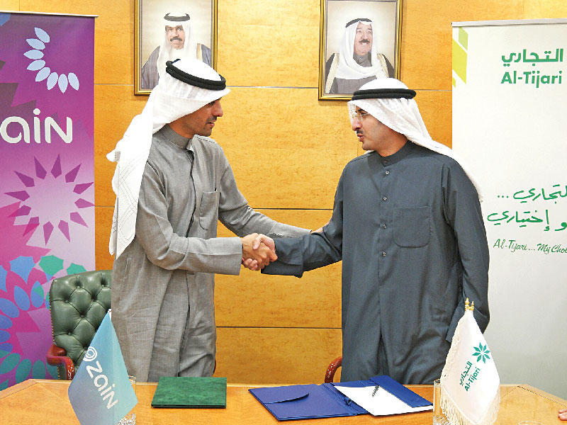 الدعيج والخرافي بعد توقيع مُذكّرة التفاهم 