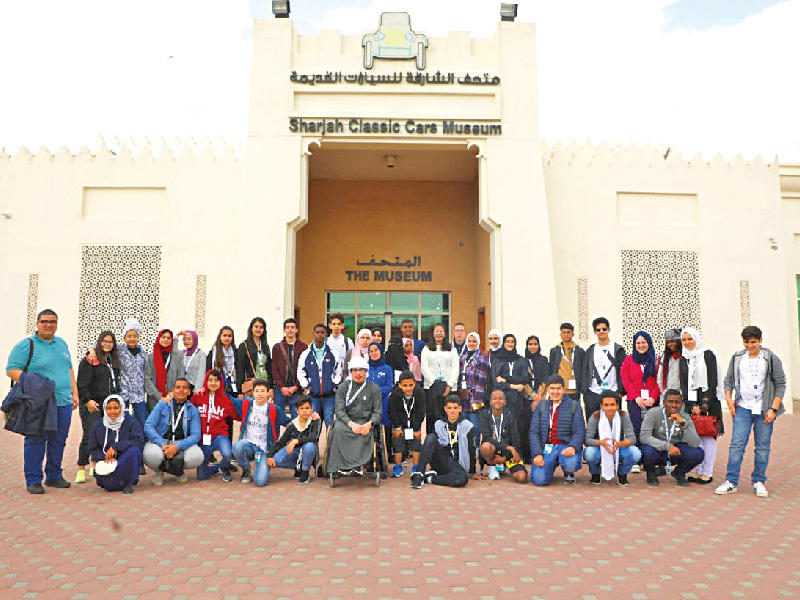 أعضاء البرلمان العربي للطفل خلال زيارتهم متحف السيارات بإمارة الشارقة