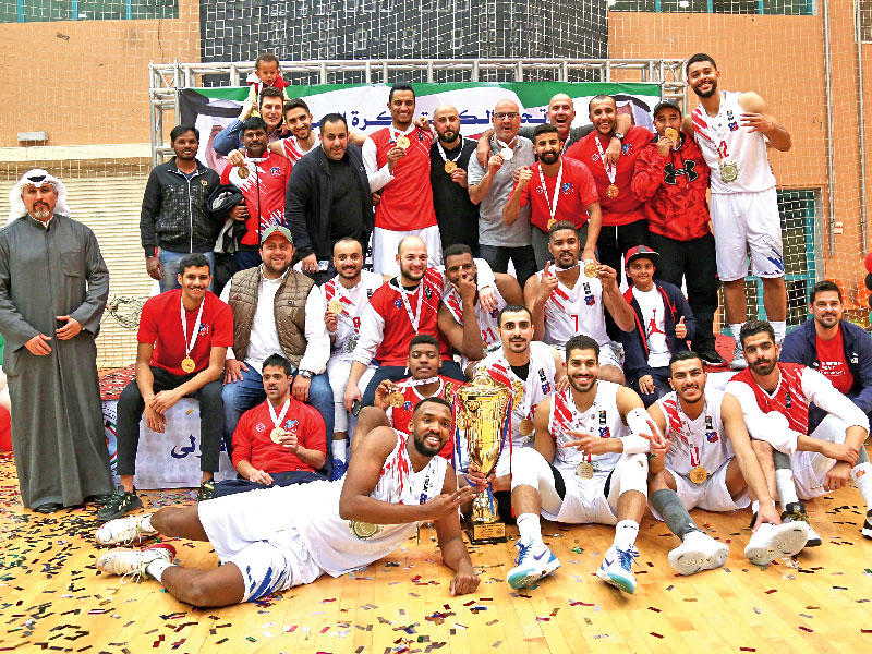 صورة جماعية لفريق الكويت بطلا للنسخة الـ 58 من دوري كرة السلة