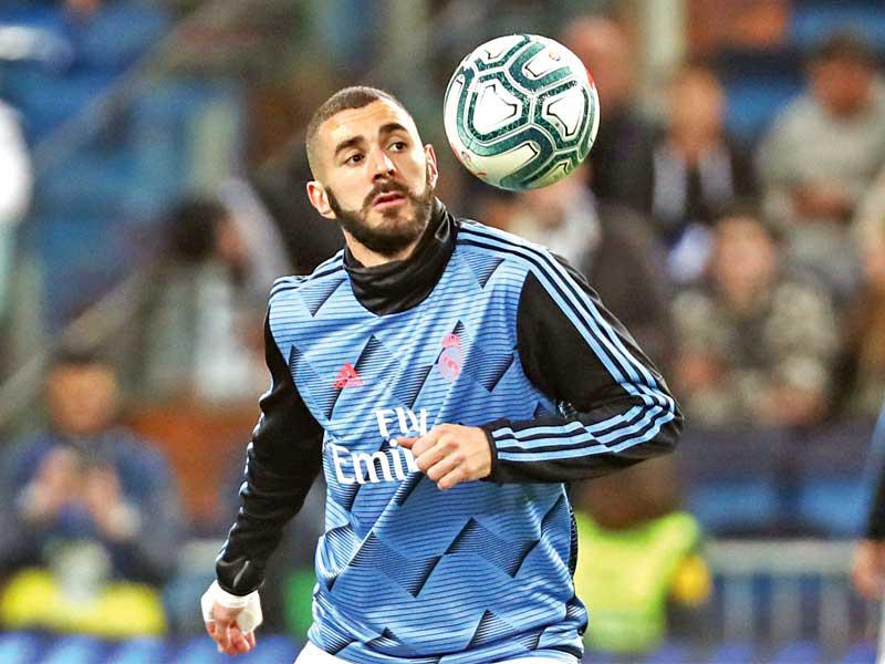  كريم بنزيمة مهاجم ريال مدريد الإسباني