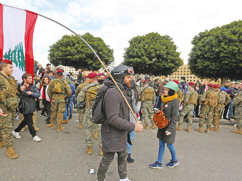 متظاهر لبناني في بيروت الشهر الماضي      (رويترز) 