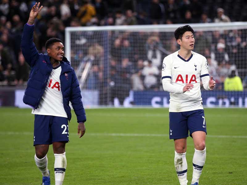 لاعبا نادي توتنهام هوتسبر الإنكليزي, الكوري الجنوبي سون هيونغ مين، والهولندي الشاب ستيفن بيرغوين