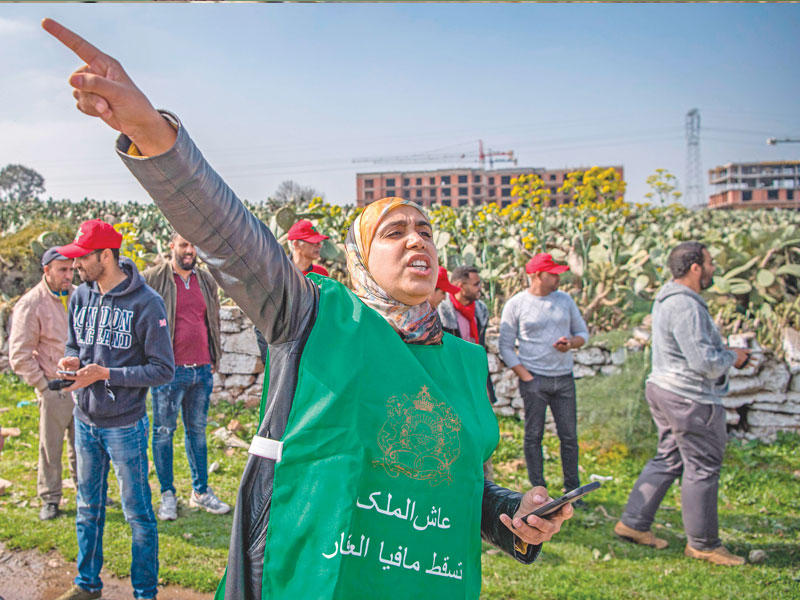 مغربية تحتج على المجموعة العقارية بالدار البيضاء في 15 فبراير               (أ ف ب)